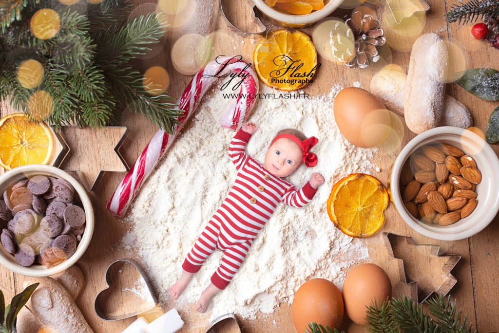 photo d un béb dans de la farine pour noël par la photographe de saint Maximin lyly flash